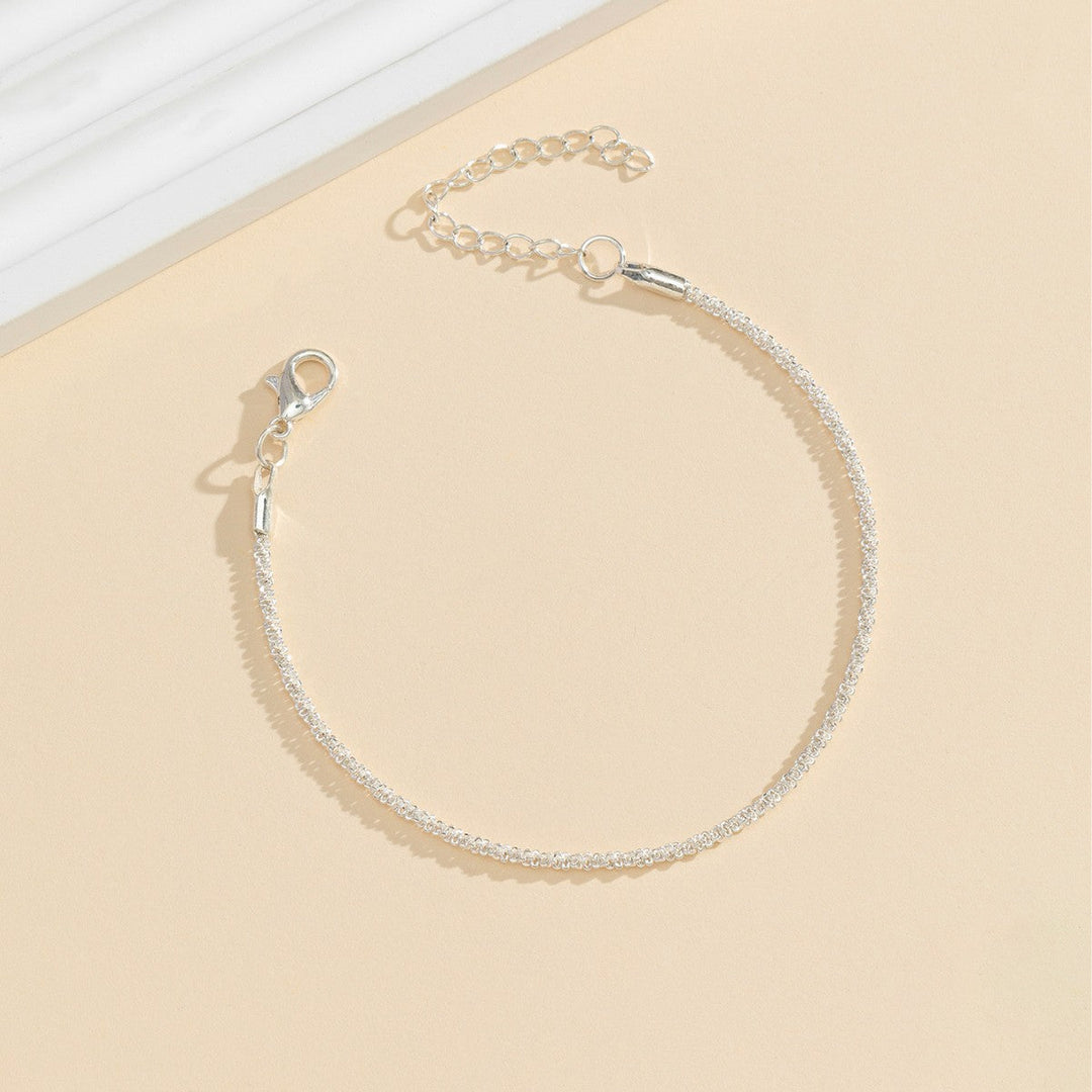 Summer-ready women's sparkling crystal anklet, adjustable silver-tone for beach or everyday elegance. Foot jewelry.
