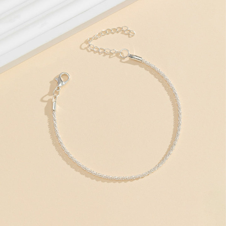 Summer-ready women's sparkling crystal anklet, adjustable silver-tone for beach or everyday elegance. Foot jewelry.