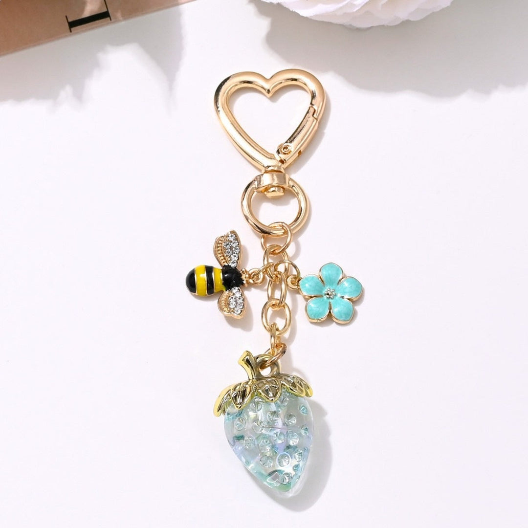 Women's sparkling strawberry key holder, cute and functional.