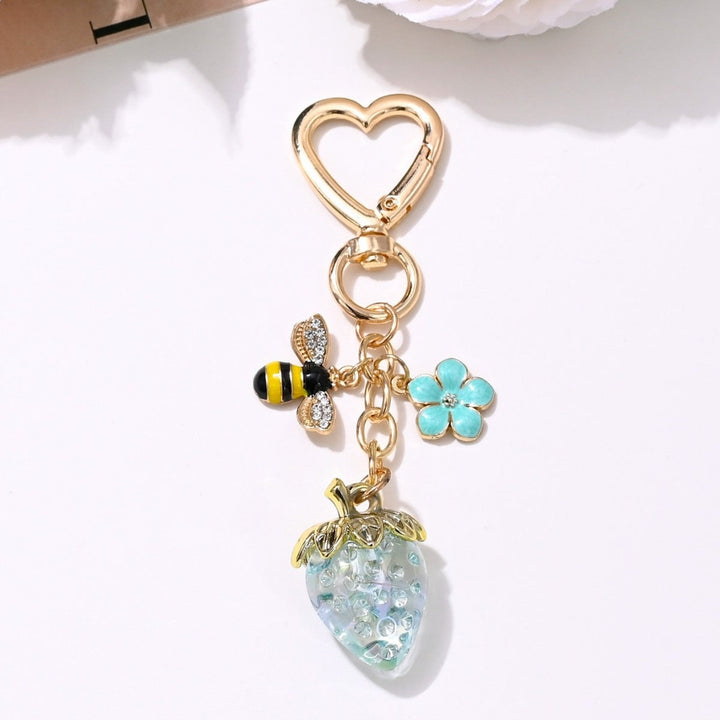Women's sparkling strawberry key holder, cute and functional.