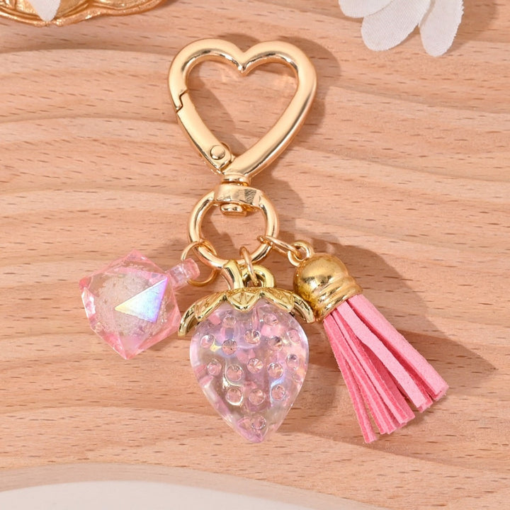 Stylish strawberry crystal keychain for women, a chic gift.