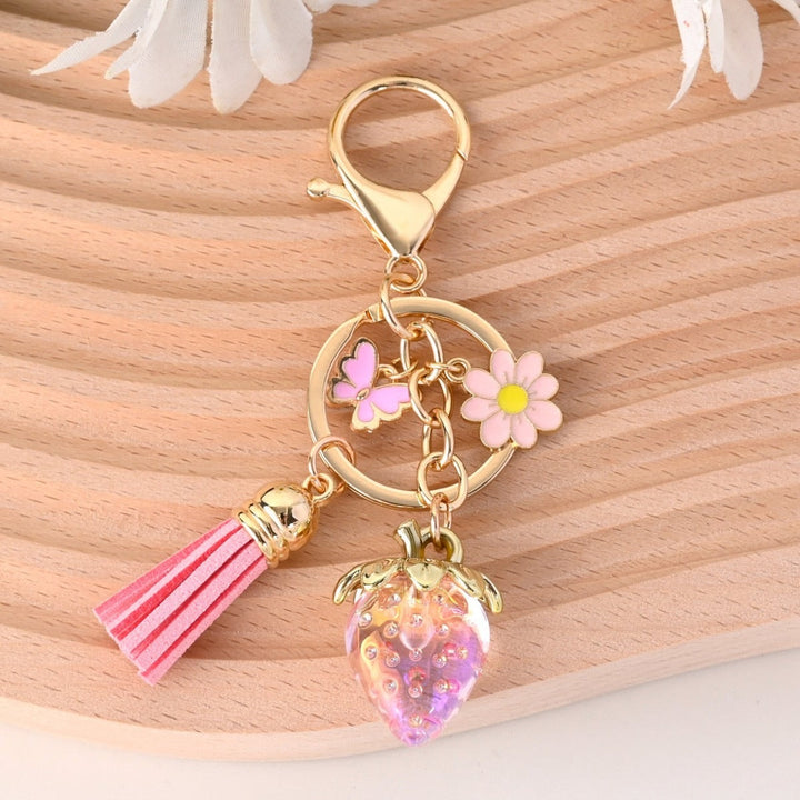 Designer sparkling strawberry keychain, a novelty fashion item.