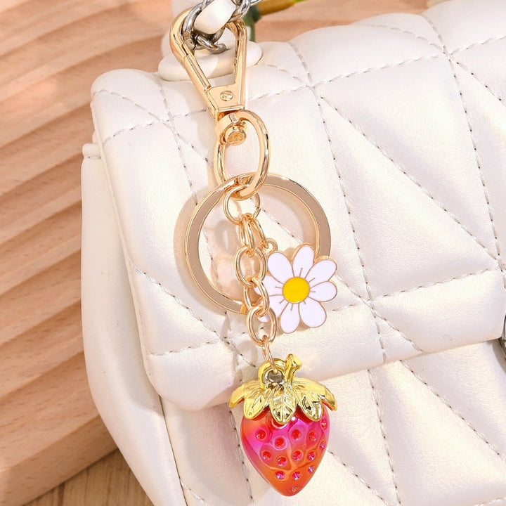 Women's fashion sparkling strawberry bag charm, stylish & trendy.