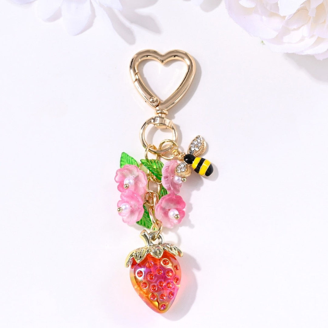 Novelty sparkling strawberry key ring for women, a charming accessory.