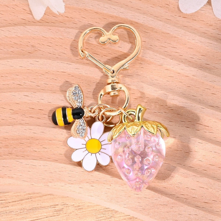 Bling strawberry key holder, ideal for purses and backpacks.