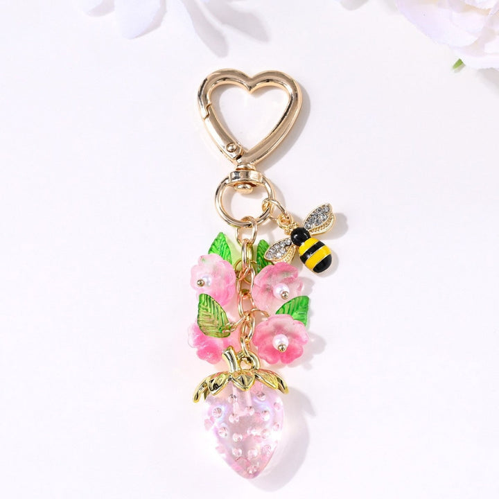 Elegant sparkling strawberry bag charm accessory, unique gift.
