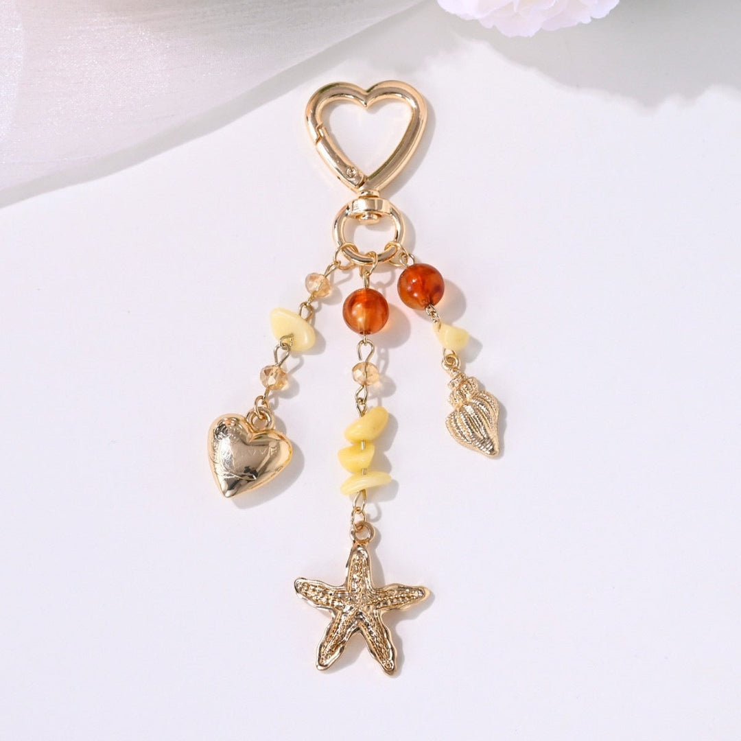 Sparkling sun & star motif keychain charm for women's bags & keys.