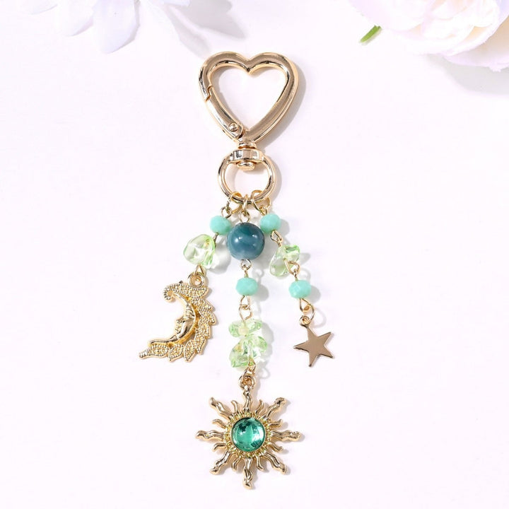 Fashionable women's sparkling sun & star motif bag charm, key ring.
