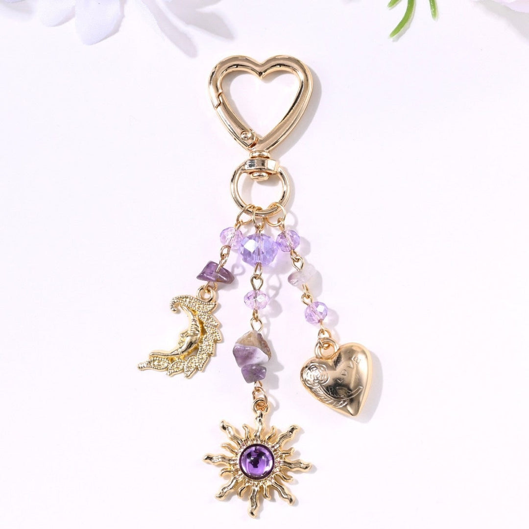 Shiny metal sun & star sparkling keychain, a women's fashion statement.
