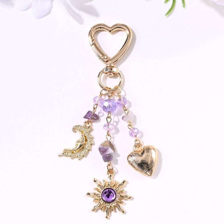 Shiny metal sun & star sparkling keychain, a women's fashion statement.