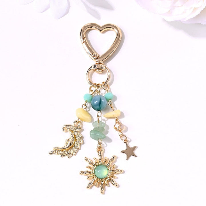 Sun and star themed sparkling women's keychain, a charming gift.