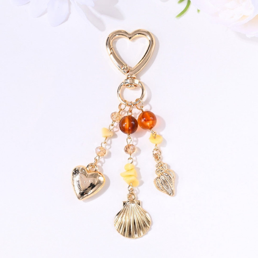 Women's fashion bag charm, sparkling sun & star design, perfect gift.