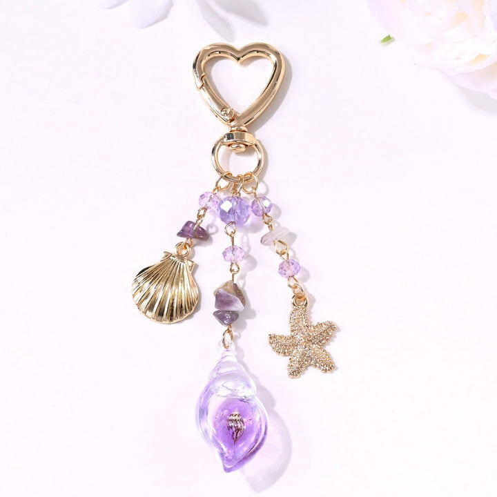 Artistic sparkling sun & star motif key holder for the stylish woman.