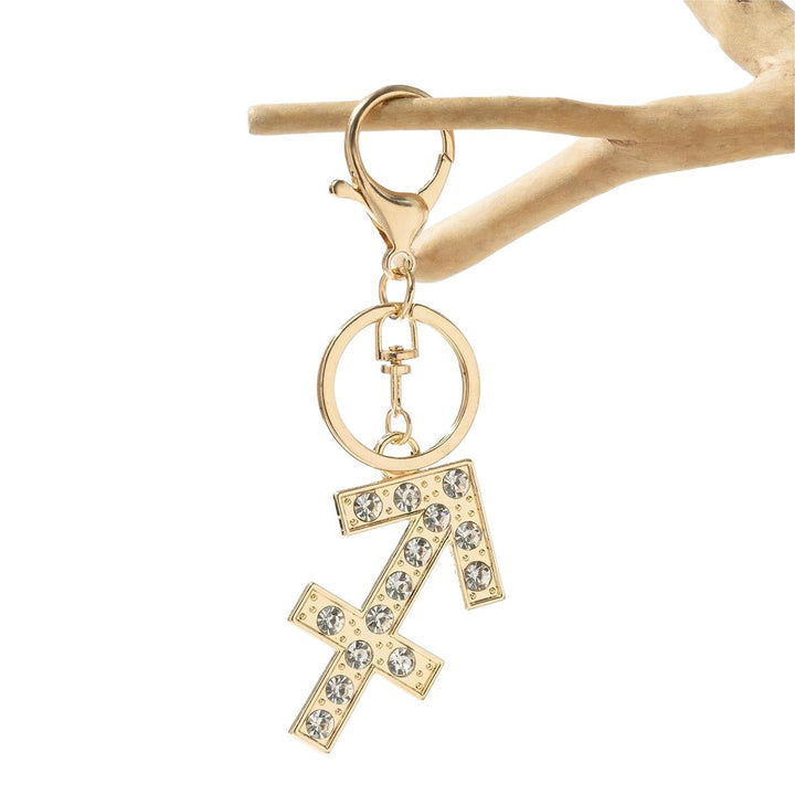 Unisex sparkling bull zodiac keychain; stylish astrology accessory, great personalized gift.