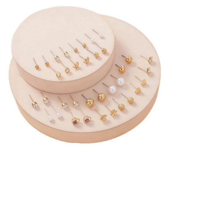 Versatile sparkling stud & dangle earring set for women, chic fashion accessory.
