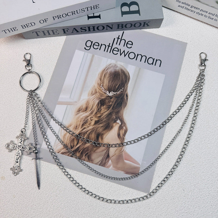 Intricate metal hair chain with dazzling crystals, a luxurious women's hair jewelry fashion accessory.