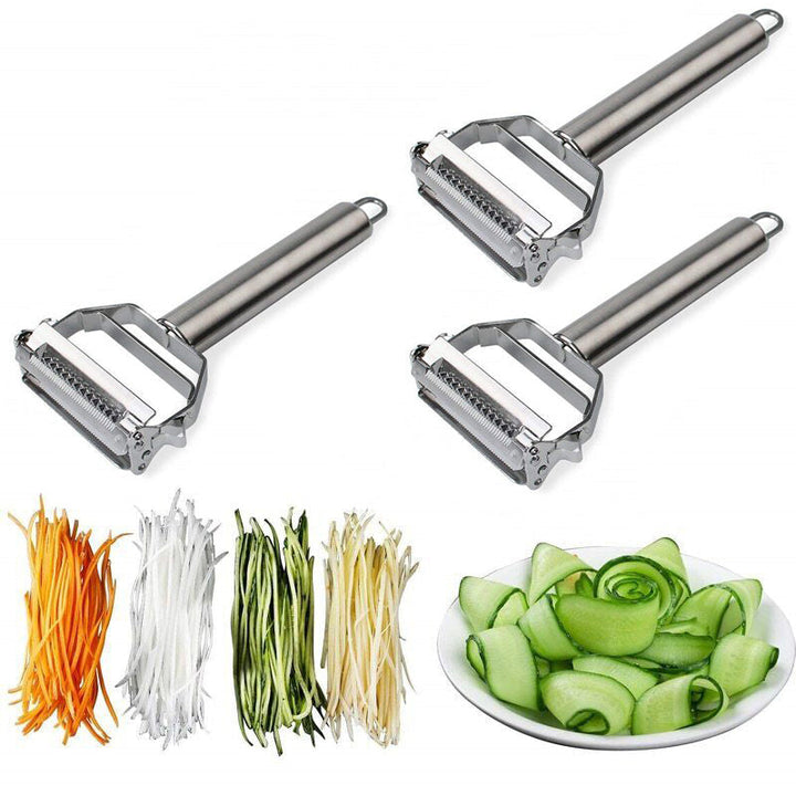 Hand holding a stainless steel dual-blade peeler, smoothly peeling a carrot for healthy food prep.