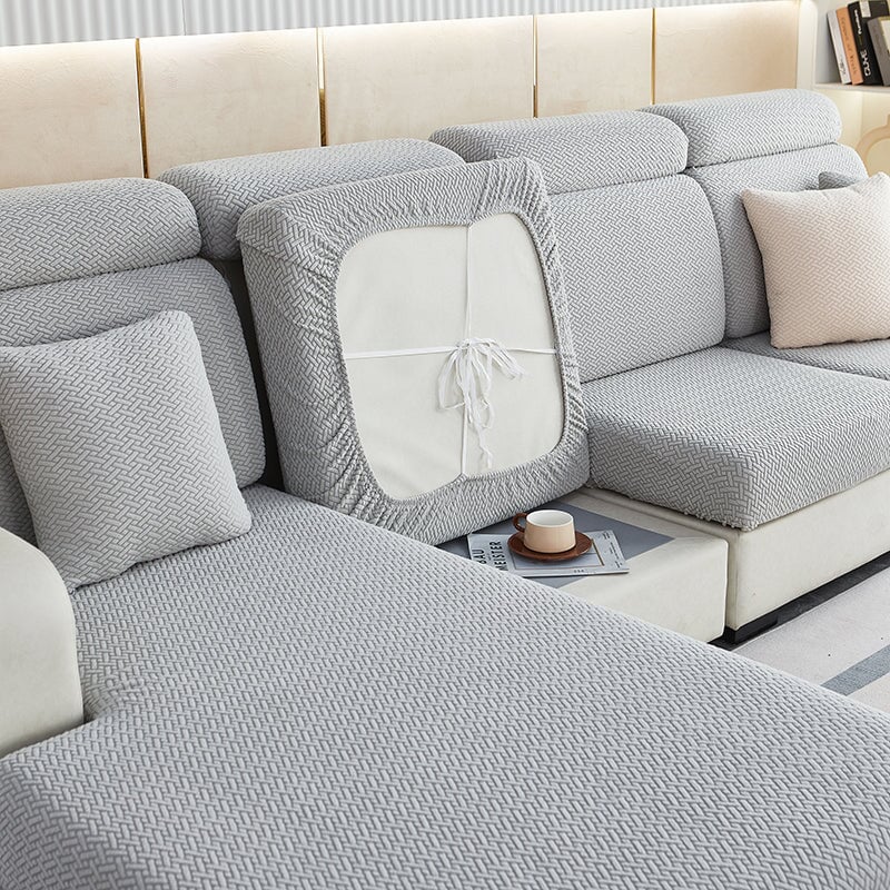 Living room sectional sofa cover, stretchable and easy to install for instant furniture refresh.