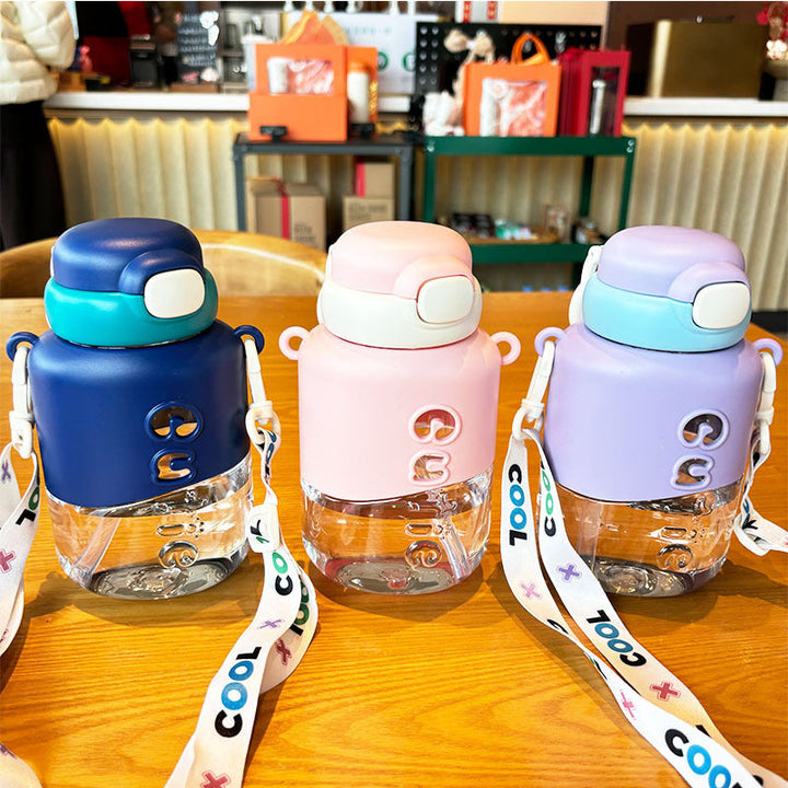 Stylish 23 fl oz women's water bottle, leak-proof with flip-top lid & carrying strap for daily hydration.