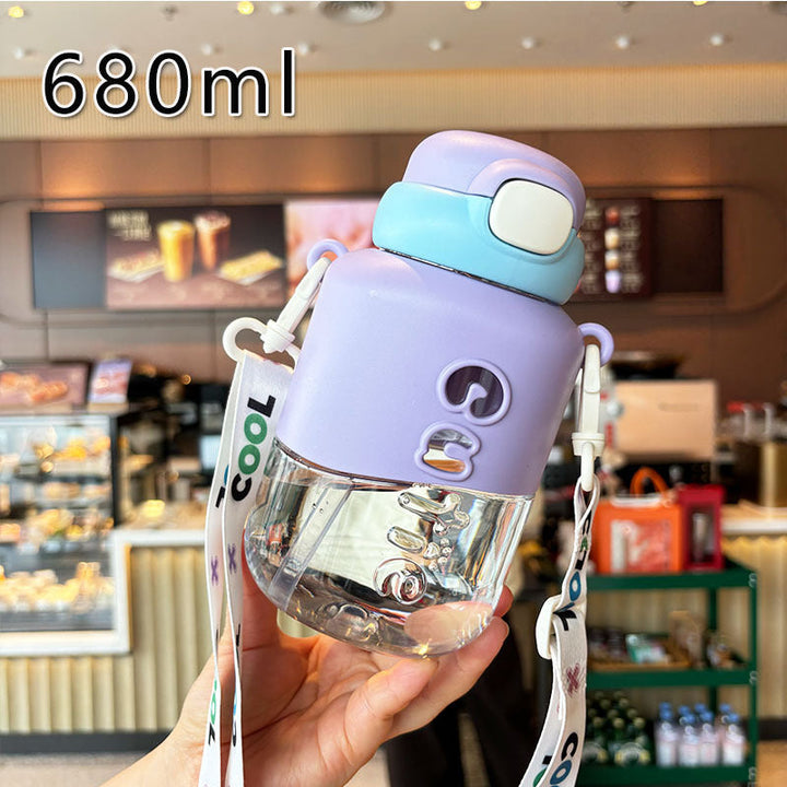 Close-up of leak-proof flip-top lid and durable carrying strap on a stylish 23oz women's hydration bottle.