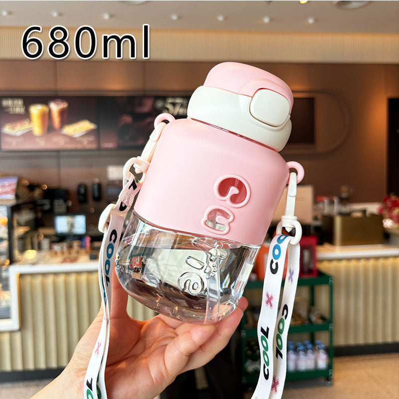 Woman holding a stylish 23 fl oz reusable water bottle, staying hydrated for gym, travel or everyday activities.