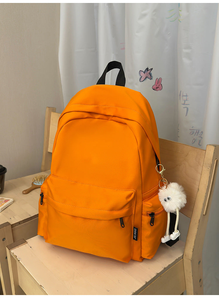 Everyday carry black minimalist unisex backpack. Multi-functional nylon school bag, perfect for daily commute.