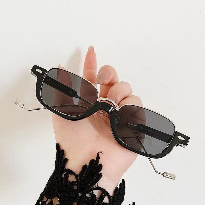 Unisex fashion rectangular eyewear, featuring durable hinges and a contemporary design.