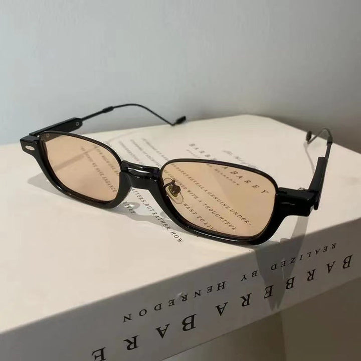 Modern rectangular spectacles on a face, perfect for a professional and stylish look.