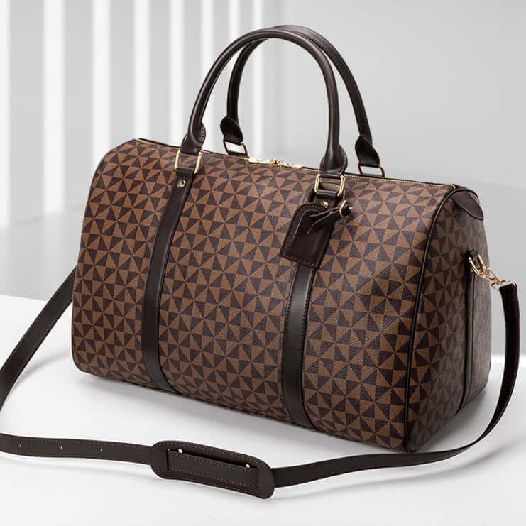 Stylish brown men's travel duffel bag; durable weekend luggage for organized trips.