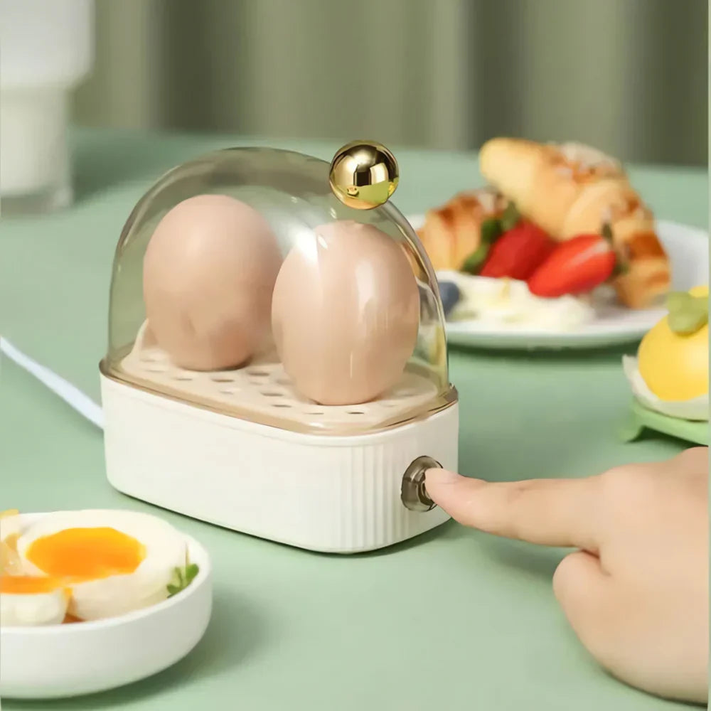 Stylish compact electric egg cooker, perfect for quick breakfasts in a retro kitchen. Boils or poaches 2 eggs.