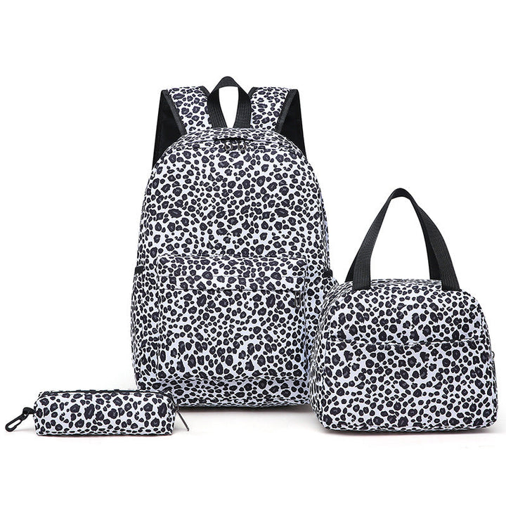 Chic leopard print women's backpack set for fashion-forward students and travelers.