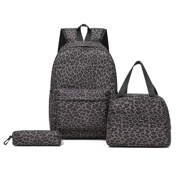 Versatile women's leopard print backpack set with spacious main bag, insulated cooler, and pencil case.
