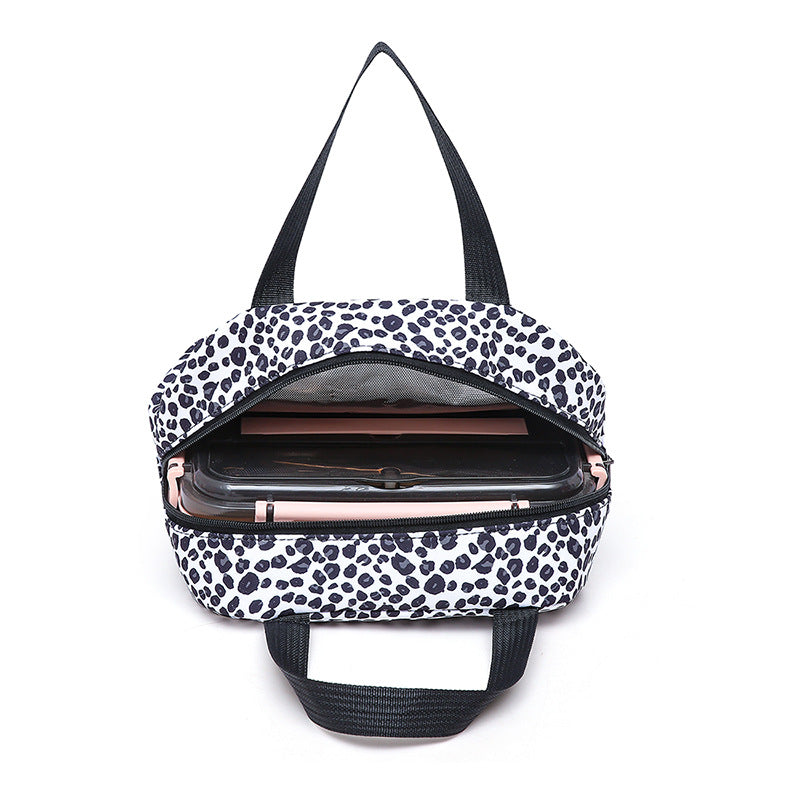 Durable leopard print women's backpack, part of a 3-piece set with lunch bag and pencil case.