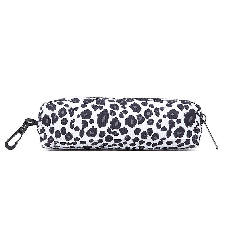 Leopard print women's school bag with comfortable straps, accompanied by a cooler and pencil case.