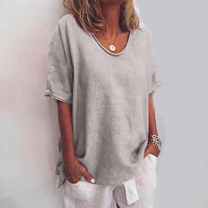Comfortable long sleeve loose blouse for women, ideal for casual everyday wear or elegant workwear.