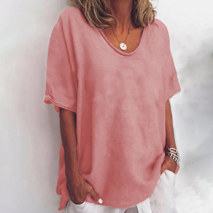 Fashionable women's everyday blouse with an easy loose fit, providing comfortable tummy coverage.