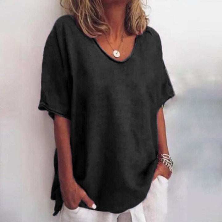 Long sleeve women's loose top, an elegant yet casual blouse perfect for versatile everyday wear.