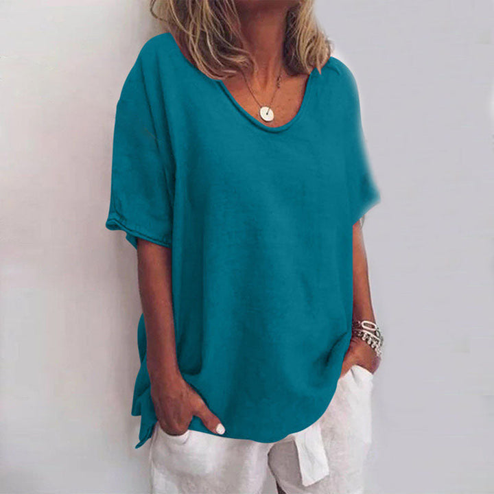 Stylish women's loose blouse, perfect workwear with comfortable tummy control and an elegant fit.