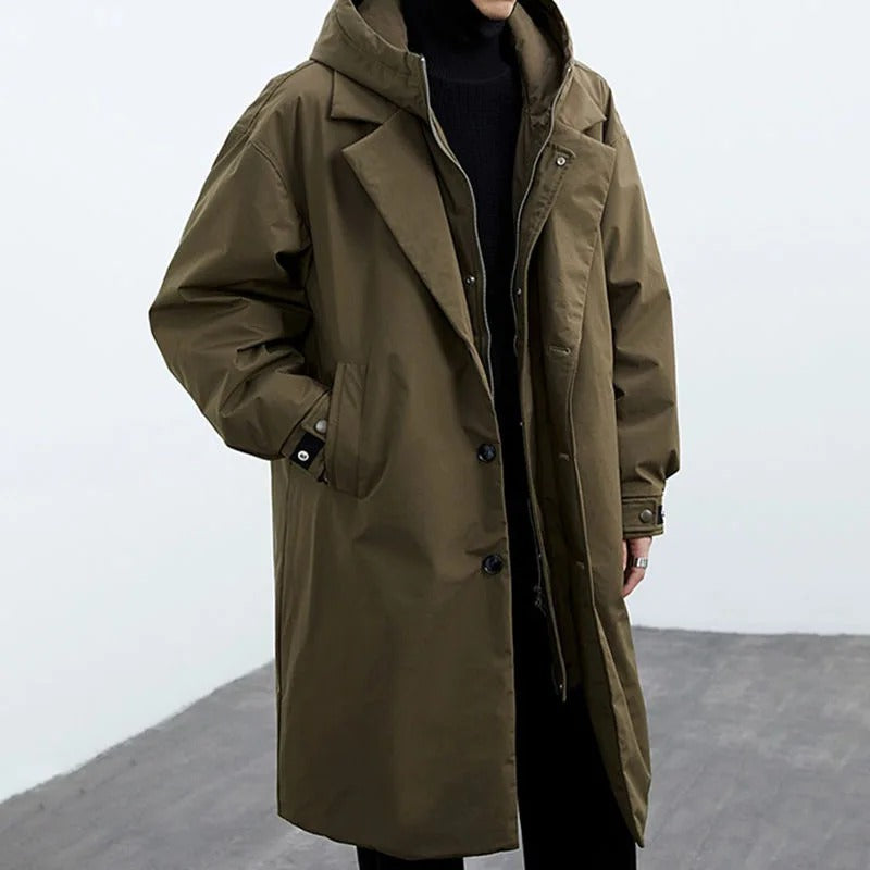 Stylish men's black hooded long trench coat. Versatile outerwear for autumn & winter city wear & men's fashion.