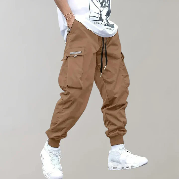 Full-length view of versatile men's stylish cargo pants, suitable for casual fashion & practical utility.