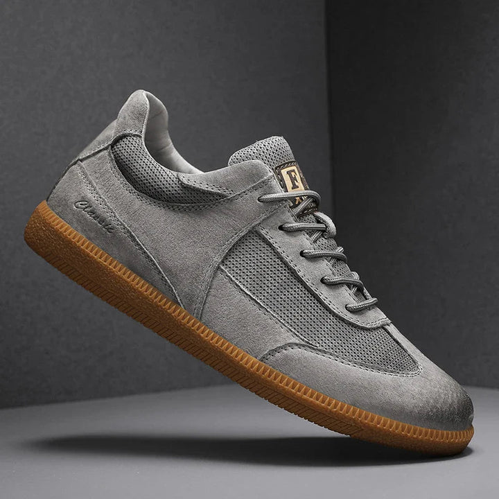 Stylish men's casual sneakers for everyday comfort & grip. Versatile modern footwear for walking & daily wear.