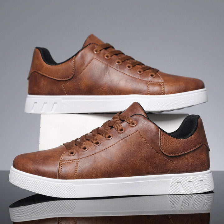 Versatile black men's lace-up sneakers, perfect for casual style and comfortable everyday wear.