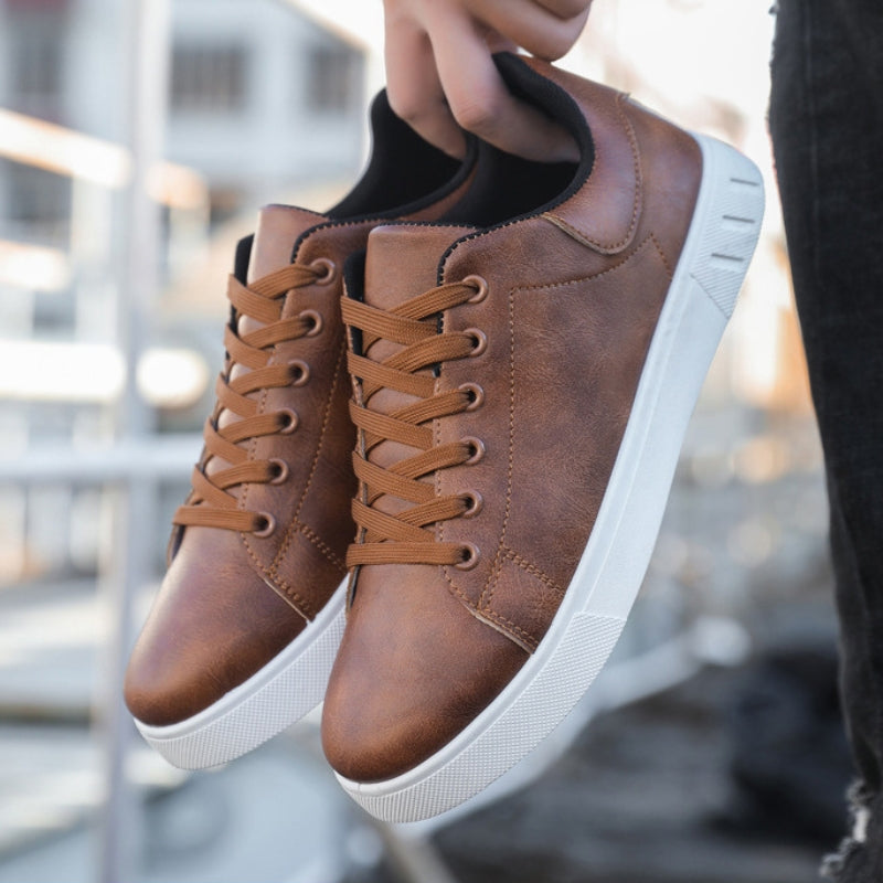 Trendy brown men's lace-up sneakers, ideal for stylish men seeking comfortable, modern casual shoes.