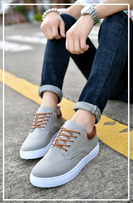 Men's fashion-forward low-top sneakers with a pronounced platform sole and lace-up closure.