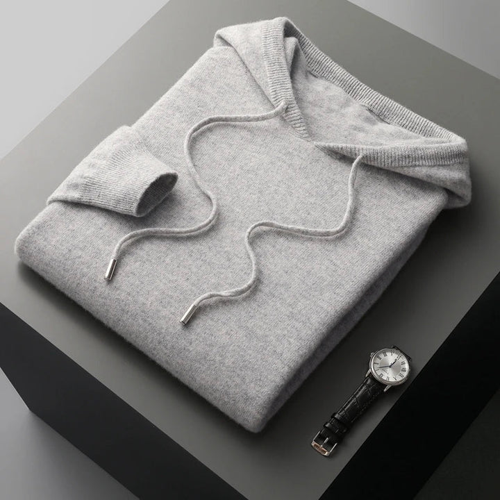 Man wearing a sleek luxury adjustable hood hoodie, perfect for relaxed yet stylish men's fashion.