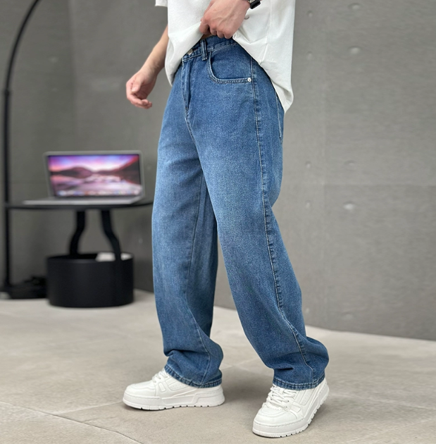 Stylish men's light blue straight leg jeans. Modern fit denim for comfortable casual wear.