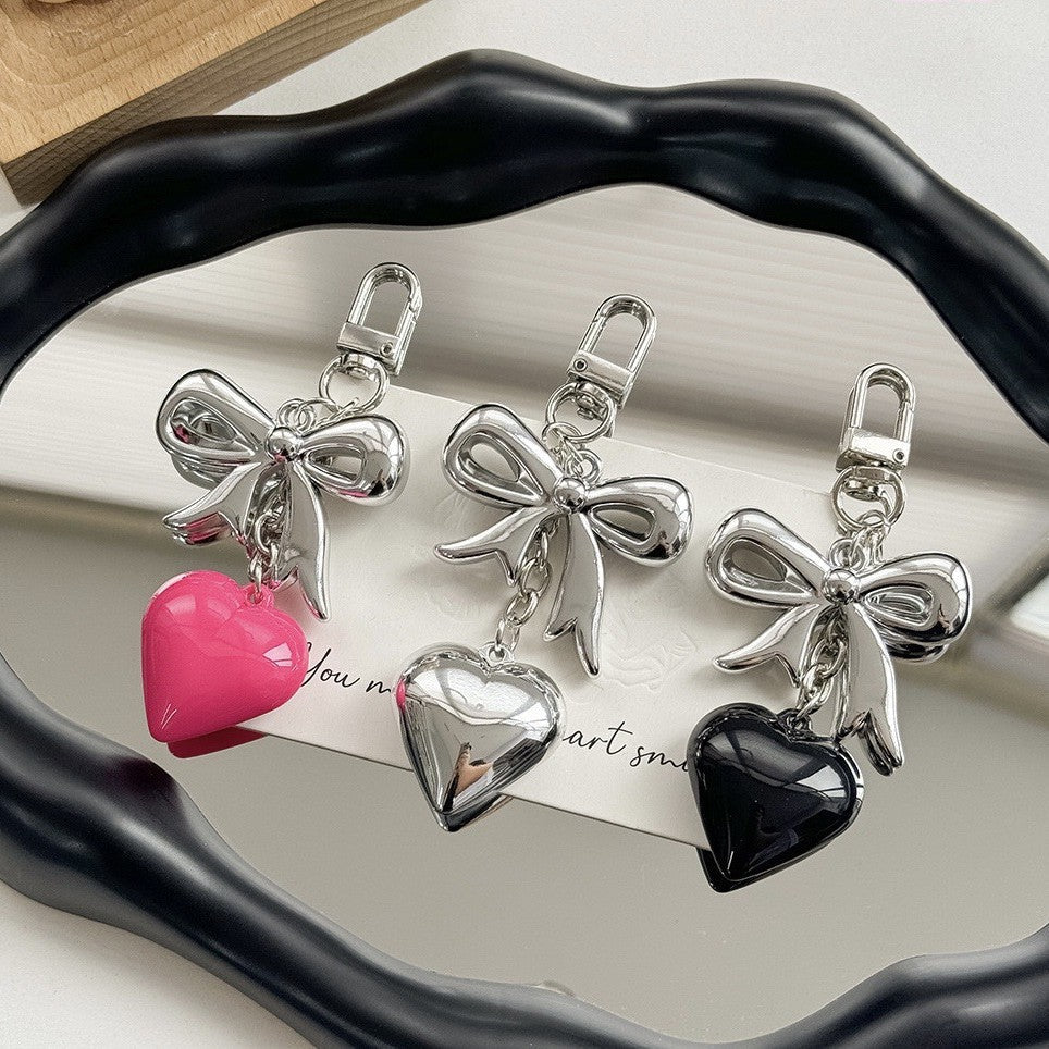 Women's durable heart keychain, a purple charm accessory perfect for bags or keys.