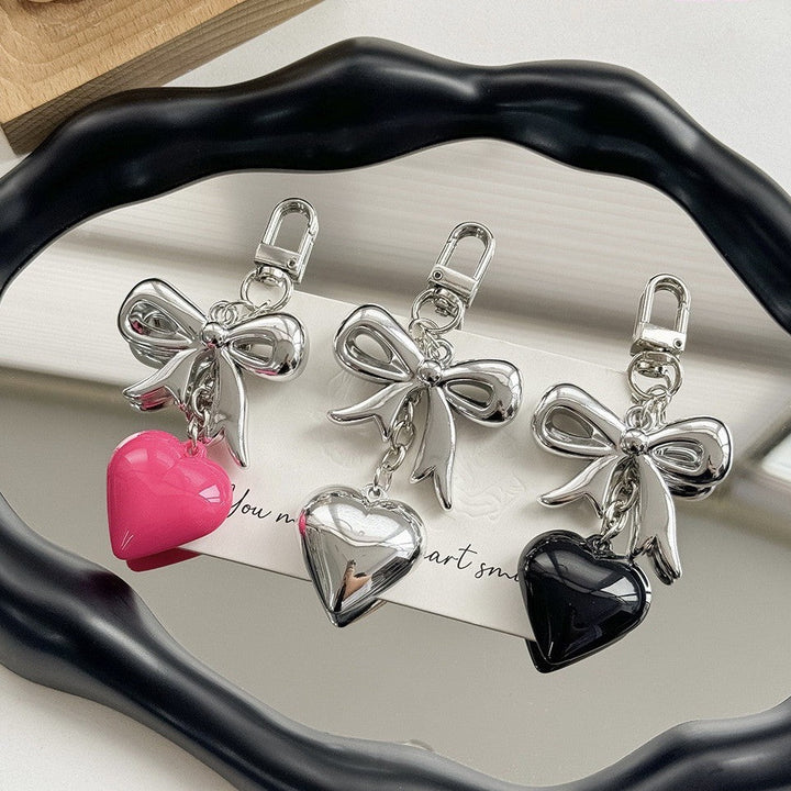 Women's durable heart keychain, a purple charm accessory perfect for bags or keys.