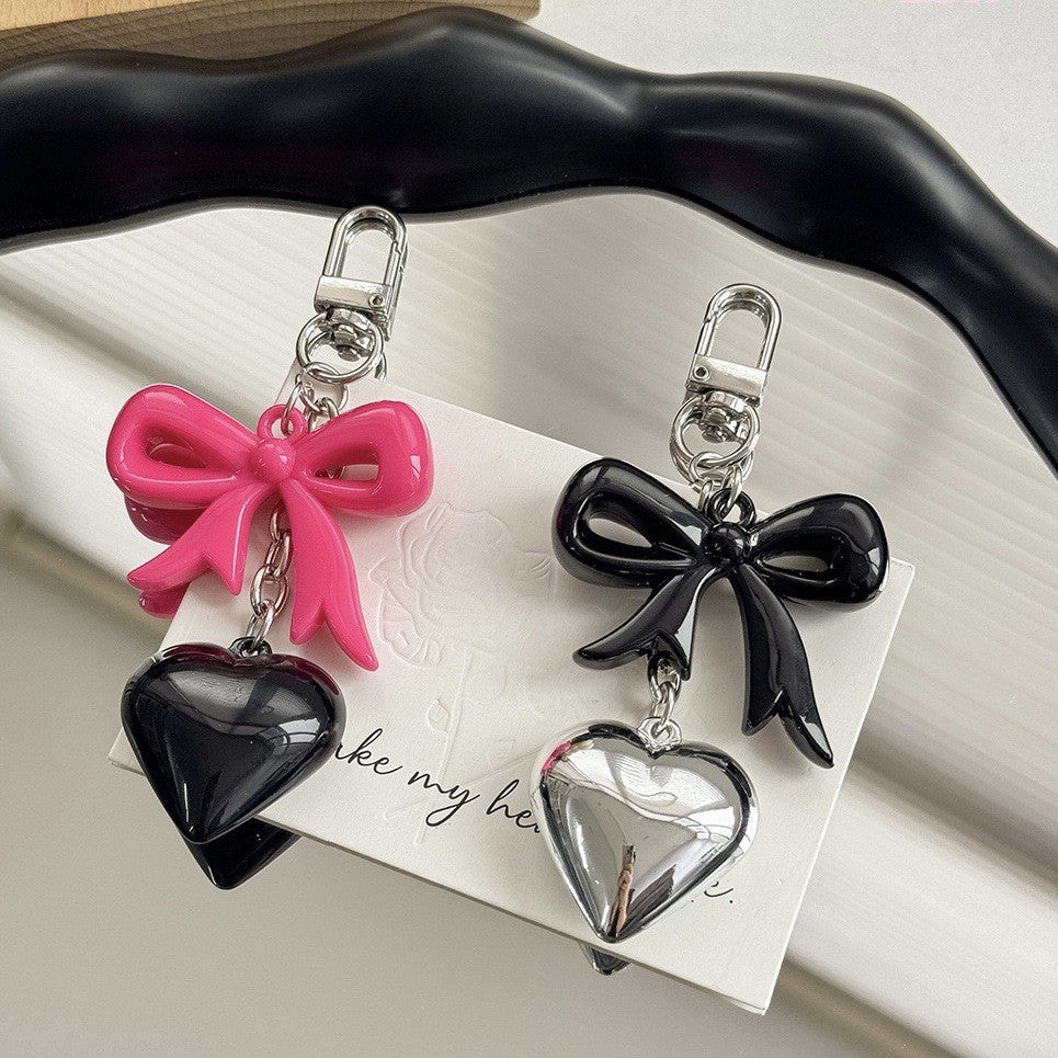 Fashionable purple heart keychain, an elegant bag charm and key holder for women.