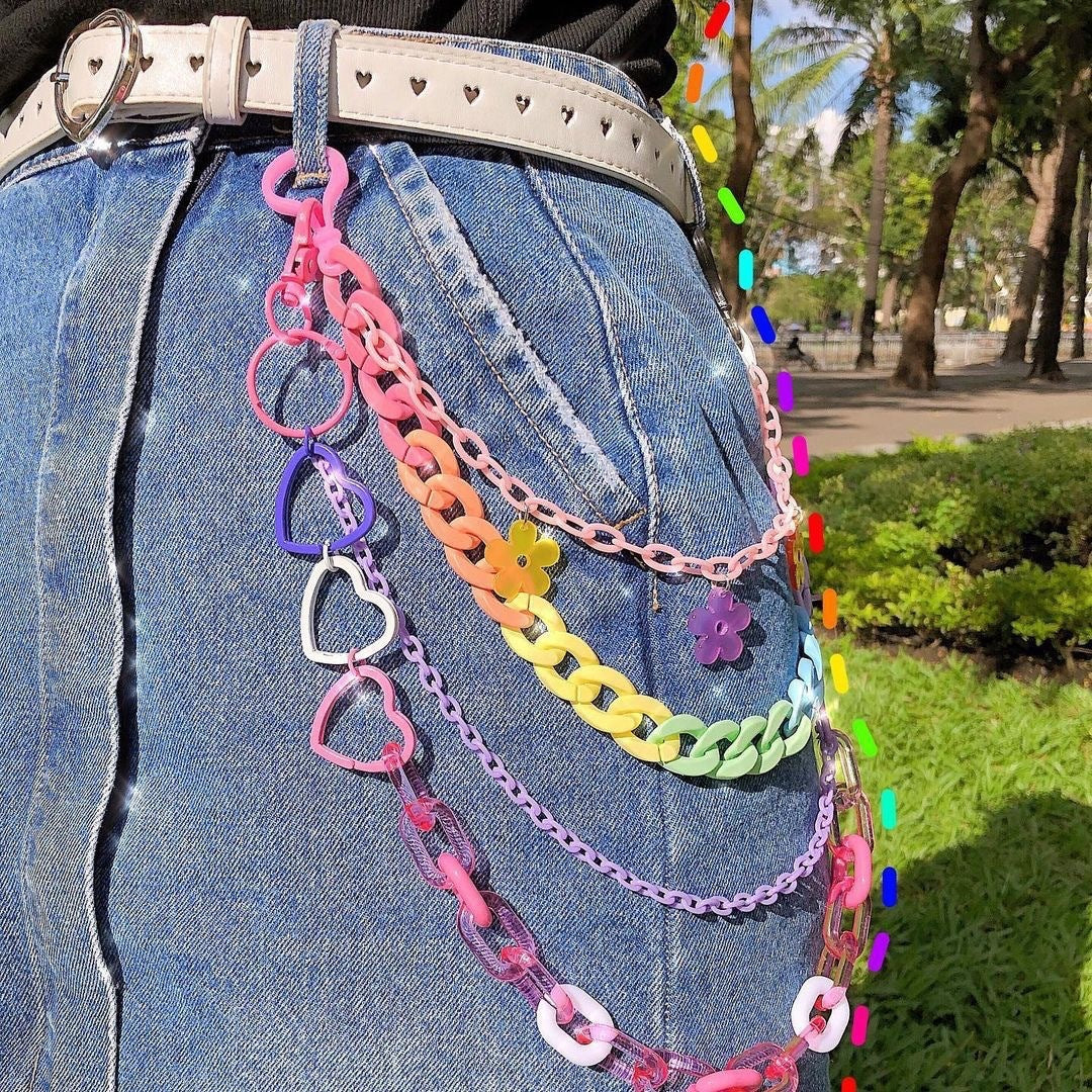 Stylish rainbow heart keychain charm for women's bags & keys. Fashion accessory & cute gift.